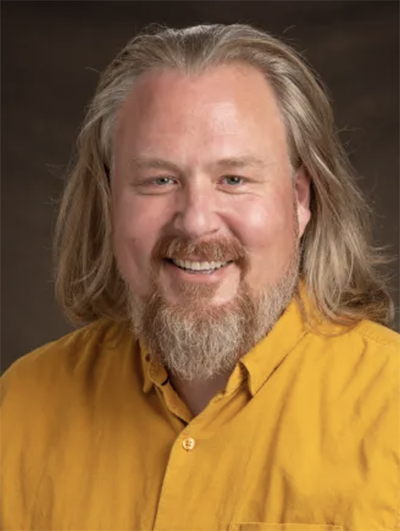 Headshot of Warren Christiansen.